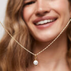 Charm ba&ntilde;ado en oro 18k con perla
